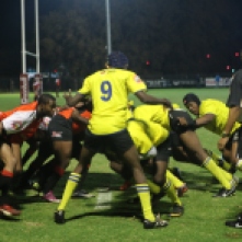 THE SCRUM: Mens res and MGI tackle each other in the scrum.