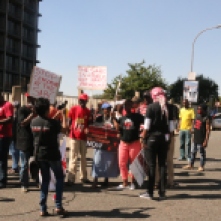 ON RED FIRE: Right2Know strengthens their protest march outside the SABC.