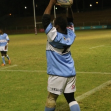 THE THROW: Monash player throws the ball to his team.